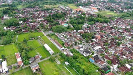 Dense-living-district-homes-of-Indonesia-near-Yogyakarta,-aerial-drone-view