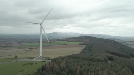 Wind-Farm-In-The-Countryside-Of-Wexford-In-Southeast-Ireland---aerial-drone-shot