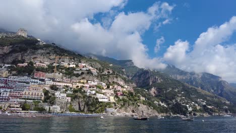 Hillside-Town-Of-Positano-On-Amalfi-Coast-Seen-While-Sailing-On-The-Mediterranean-Sea-In-Italy