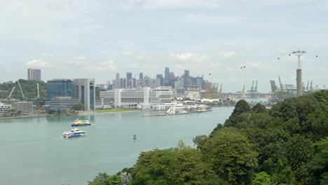 Aerial-static-shot-of-Singapore-Sentosa-island-view-of-bay-pier-sea-with-cruise-yacht-static-shot