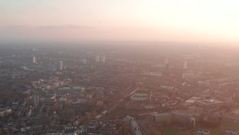 Circling-aerial-shot-around-south-London-Brixton-Camberwell-Clapham-Neighbourhoods-at-sunset