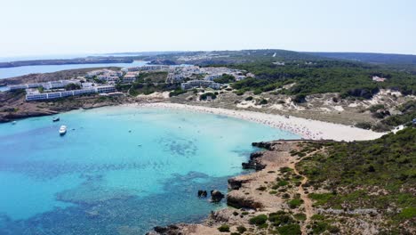 Luxury-beach-front-properties-line-the-coast-line-of-Son-Parc-beach-in-Menorca