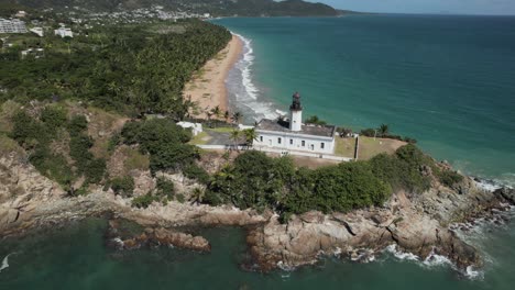 Lighthouse-on-cliff-drone-aerial