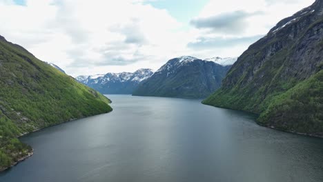 Sunnylvsfjorden-ahead-with-Korsfjoden-and-Geirangerfjord-ahead-and-to-the-right-side---Aerial-above-Norwegian-wild-fjord