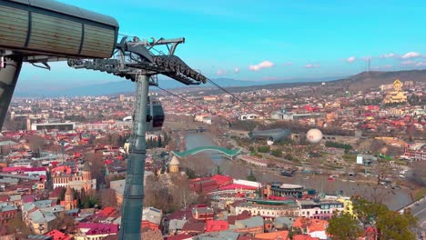 Top-view-of-Tbilisi.-Cable-car-going-uphill