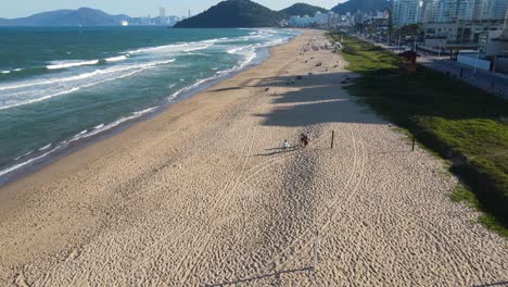 Drone-flying-above-the-beach-in-praia-Brava-in-Brazil