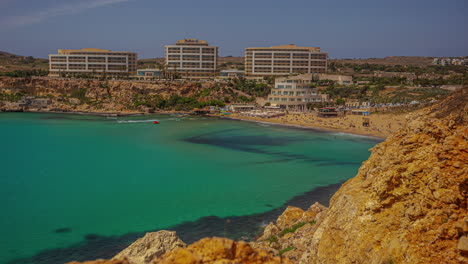Golden-Bay-beach-and-resort-area-of-Ghajn-Tuffieha,-Malta---time-lapse