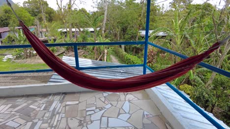 A-hammock-hanging-in-a-veranda