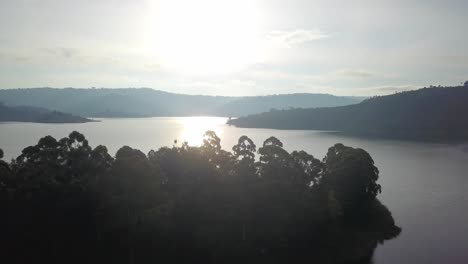 Tranquil-Scene-At-Lake-Bunyonyi,-Uganda-During-Sunset---aerial-shot