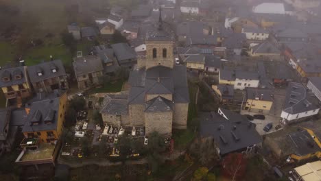 Tranquil-drone-footage-reveals-a-scenic-church-surrounded-by-a-cemetery