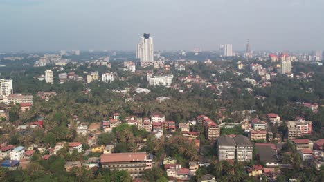 Mangalore's-aerial-view-of-trees-surrounding-the-city's-buildings