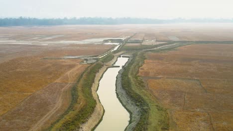Aerial-shot-panning-over-large-river