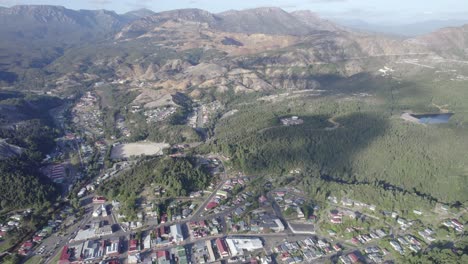 Historic-Mining-Town-Of-Queenstown-In-Tasmania-Surrounded-By-Mountains