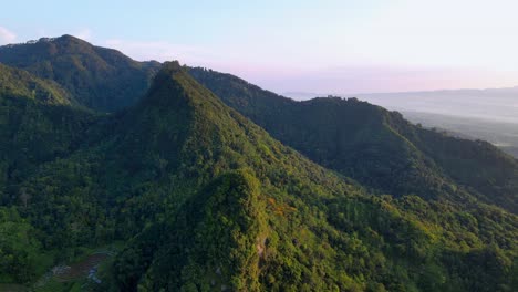 Aerial-view-of-tropical-rainforest-on-the-hills-from-high-flying-drone