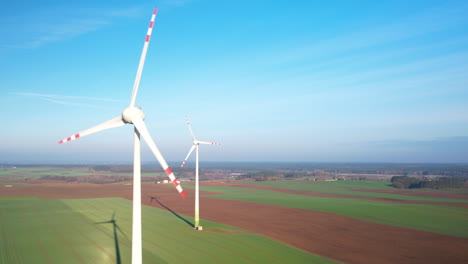 Wind-Turbine-Renewable-Green-Energy-Farm-At-Daytime---drone-shot