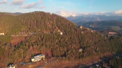Amazing-aerial-shot-of-Austria-mountain-forest-landscape-in-semmerling,-golden-hour