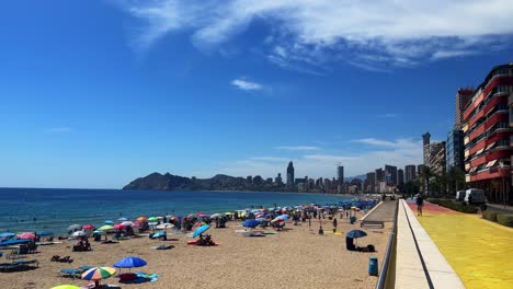 Beach-in-Benidorm-in-Spain-during-the-day-half-empty-pan-to-the-right-4K-30-fps