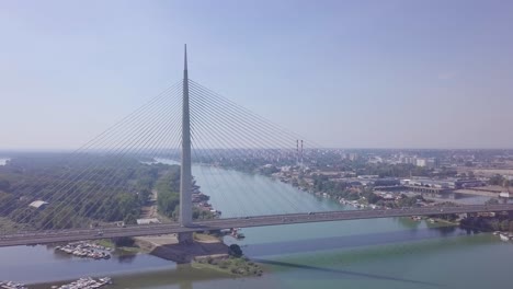 4k-orbiting-establishing-shot-of-Ada-bridge-in-Belgrade,-Most-na-Adi