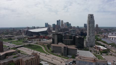 Super-wide-aerial-dolly-shot-of-the-Minneapolis-skyline-in-Minnesota