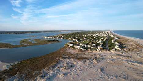 Wide-revealing-drone-shot-of-shoreline-and-beach-homes-at-The-Point-at-Emerald-Isle-NC