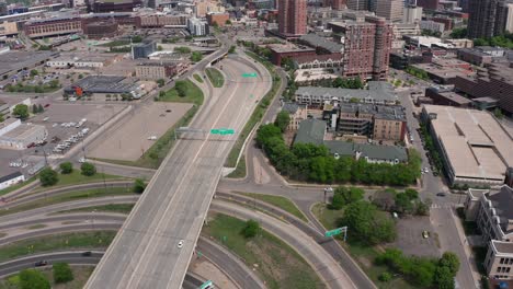 Aerial-tilting-up-shot-to-reveal-downtown-Minneapolis,-Minnesota