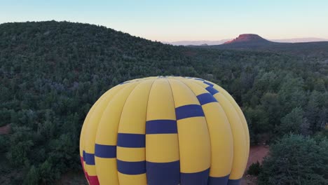 Hot-Air-Balloon-Getting-Ready-For-Flight-In-Sedona,-Arizona---drone-shot