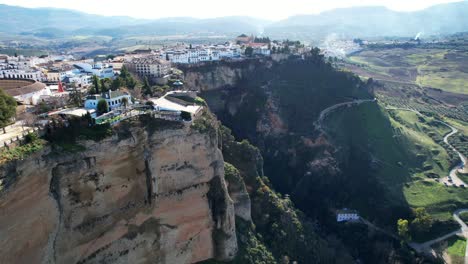 Luxury-home-and-hotels-on-epic-cliffs-of-Ronda-Spain-with-high-sun