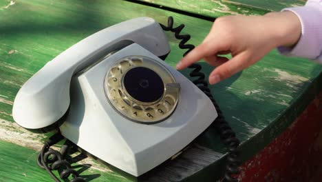 Young-kid-is-testing-an-old-soviet-wired-phone