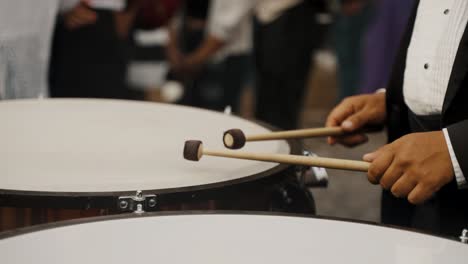 Man-Playing-Drums-During-Semana-Santa-Processions-In-Historic-City-Of-Antigua,-Guatemala