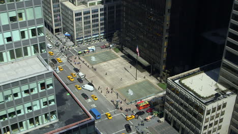 Seagram-building,-traffic,-yellow-cabs,-Park-avenue,-skyscraper,-midtown,-manhattan,-new-york,-usa,-america