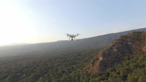 Recreation-drone-flying-above-rocky-tropical-mountains-in-Mexico