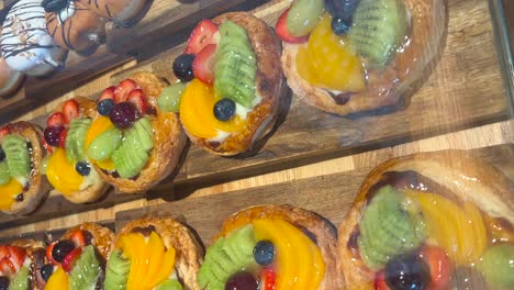 Fruit-candy-with-puff-pastry,-sweet-in-Spanish-cafeteria-with-vertical-view