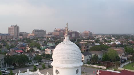 Drone-view-of-Statue-on-top-of-the-Sacred-Heart-Catholic-Church-in-Galveston,-Texas
