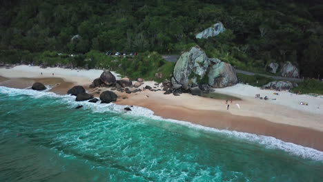 Aerial-Shot-of-Waves-Washing-Ashore-on-Beach-North-of-Rio-De-Janeiro,-Brazil