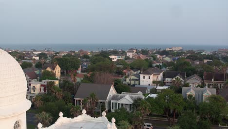 Drone-view-of-Sacred-Heart-Catholic-Church-and-surrounding-area-in-Galveston,-Texas