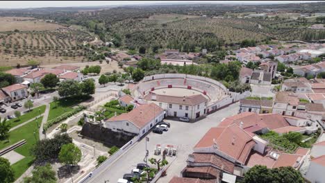 Orbiting-shot-of-Arronches-bullring-in-Alentejo-countryside,-Portugal