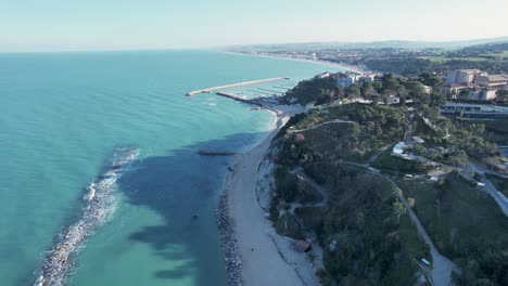 Numana-village-beach,-Conero-Riviera-in-Le-Marche,-I-Italy,-drone-aerial-footage