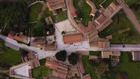 Aerial-top-down-view-of-Tratalias-townscape-rooftops-in-South-Sardinia,-Italy