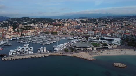 Drone-shot-boat-port-and-Palace-of-Festivals-and-Congresses-in-Cannes