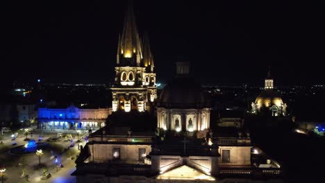 Guadalajara-Night-Aerial-Pan-Up-To-Catedral-De-Guadalajara