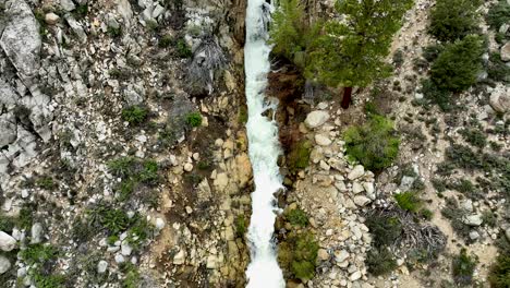Sierra-Nevada-snowmelt-rushing-waterfall-aerial-shot