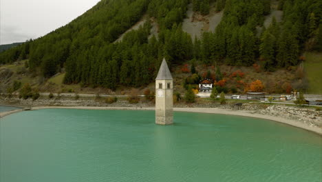 Aerial-View-Of-Submerged-Bell-Tower-At-Reschensee