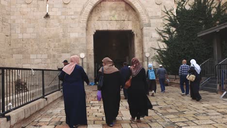 Muslim-Female-Friends-walking-together-Meeting-In-Urban-Environment