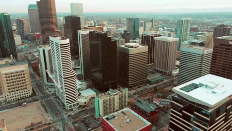 Aerial-drone-view-of-Downtown-Denver,-Colorado-during-sunset