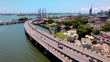 Ikoyi-Victoria-Island,-Lagos-Nigeria--April-10-2023:-Cityscape-of-Ikoyi-along-a-dual-carriage-bridge