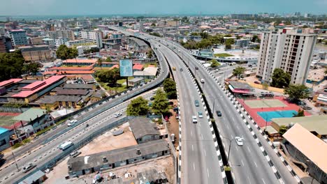 Ikoyi-Victoria-Island,-Lagos-Nigeria--April-10-2023:-Cityscape-of-Ikoyi-along-a-dual-carriage-bridge
