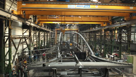 Fabrication-of-new-steel-bridge-in-industrial-steelworks-factory-hall