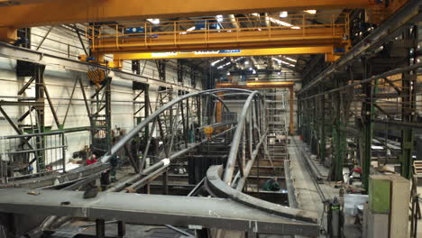 Workers-preparing-new-bridge-in-Brno-steelworking-factory-welding-hall