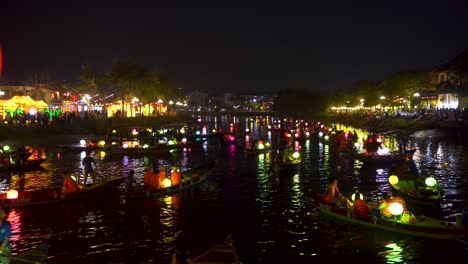Stunning-lantern-illuminations-at-night-in-Hoi-An-Vietnam-with-river-and-boats