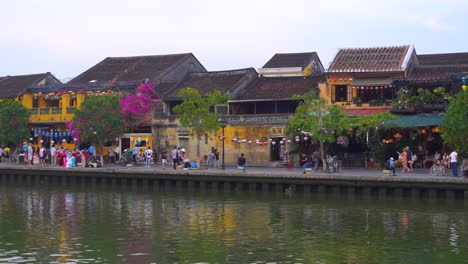 Typical-Vietnamese-Row-Houses-in-Hoi-An-with-reflections-in-river